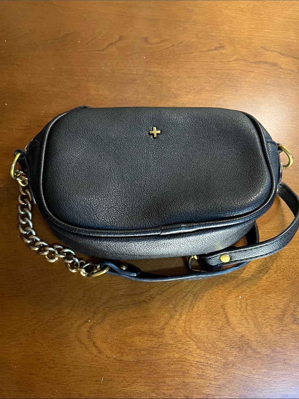 PETA + JAIN Black Leather Crossbody Bag with Gold Chain Accent